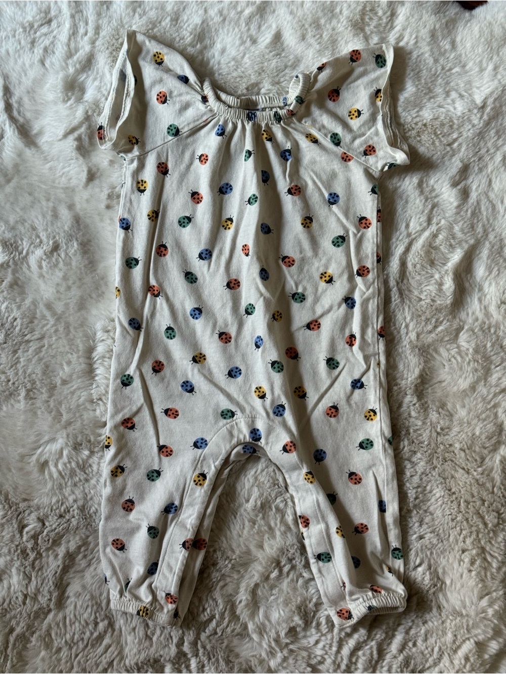 Hanna Andersson Cream Baby Romper with Multicolor Ladybug Accents